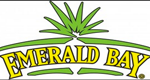 A logo of emerald bay resort