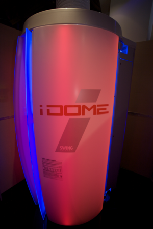 A white and red lighted pedestal with the word " idome 7 " on it.
