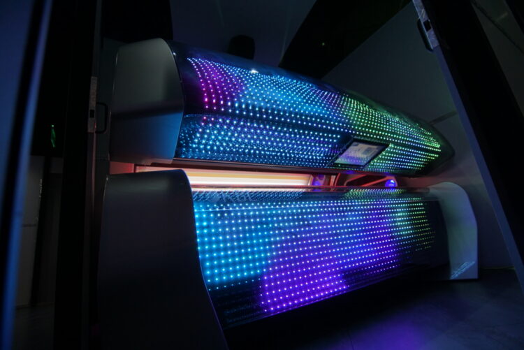 A tanning bed with lights on it